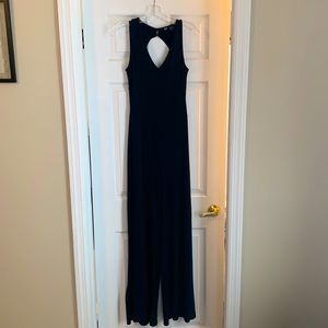 Long one piece open back slinky soft right pant-jumper size S